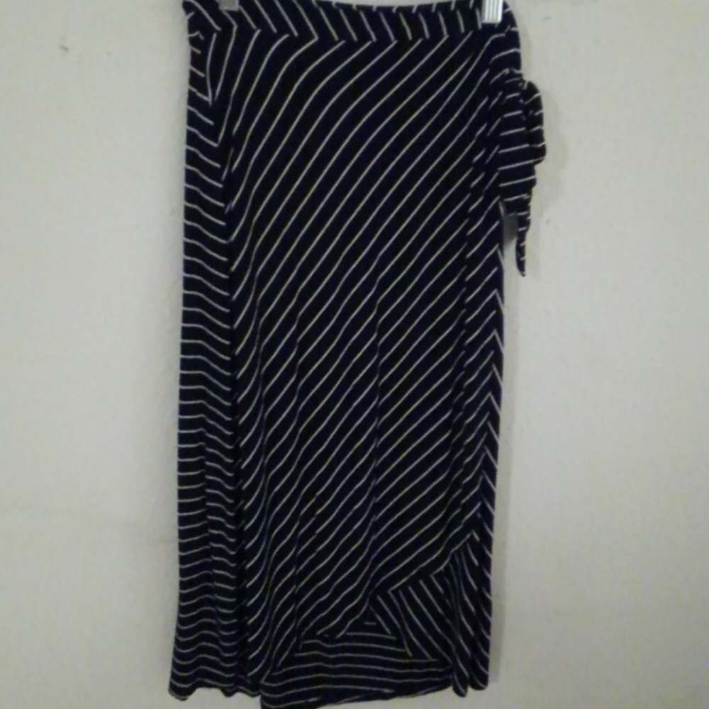 Skirt. New. Never worn, but I tore off tags